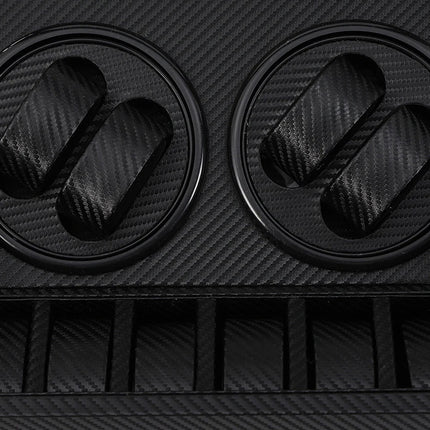 Black carbon fiber patterned surface with circular cutouts