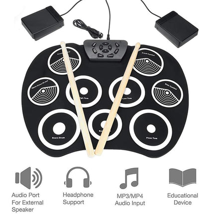 Electronic drum pad with drumsticks on a white background