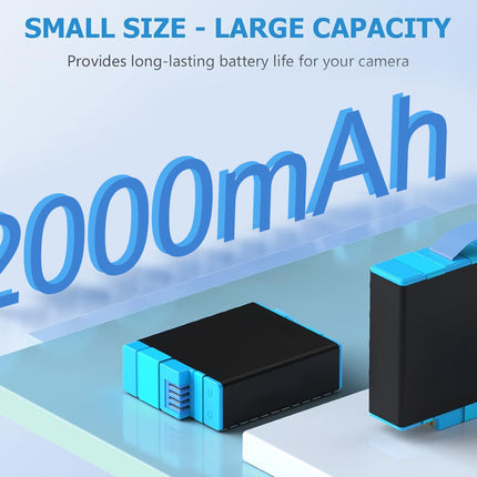 Two camera battery packs with a black body and bright blue accents, displayed on a light blue and white platform with large 3D text reading '2000mAh' and the headline 'SMALL SIZE - LARGE CAPACITY'.
