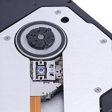 Close-up of a mechanical component, possibly from electronic equipment, on a white background.