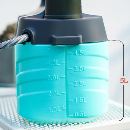 A close-up of a translucent aqua blue plastic water container with embossed measurement markings from 0.5L to 4.