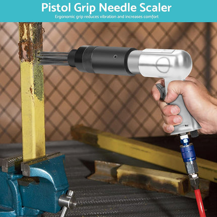 Pistol grip needle scaler being used on a wooden surface with a chain-link fence background.