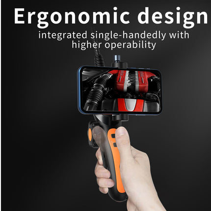 Hand holding a tool with ergonomic design features on a dark background