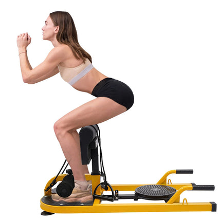 Woman using a yellow exercise machine on a white background