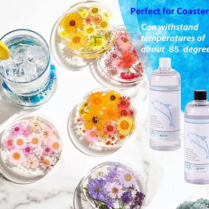 Coasters with floral designs and cleaning bottles on a marble surface.