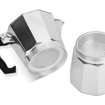 Metal coffee percolator on a white background