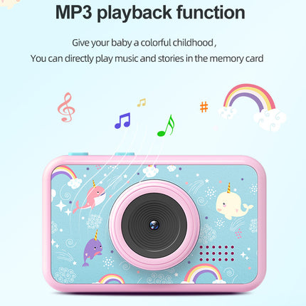 A pink and light blue baby toy camera with cartoon unicorn and rainbow graphics, shown with text advertising MP3 playback function on a light blue background.