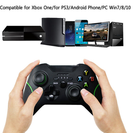 A black wireless game controller with green accents is held by two hands against a white background. Above the controller, text reads 'Compatible for Xbox One/for PS3/Android Phone/PC Win7/8/10' and small images of compatible devices appear at the top.