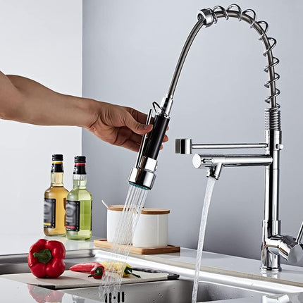 Modern kitchen faucet with water flowing, set against a neutral background.