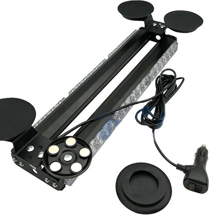 Black electronic device with fans, cable, and car adapter on a white background