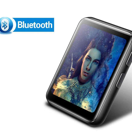A black rectangular smartwatch or media player shown at an angle on a white background, with a blue Bluetooth logo graphic in the upper left. The screen displays a colorful portrait image.
