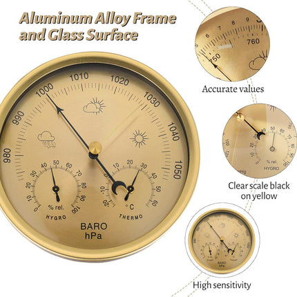 Gold-colored barometer with detailed features on a white background