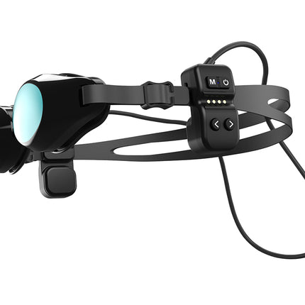 Black head-mounted device with goggles on a white background