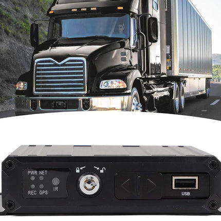 Truck on a road with a close-up of a black electronic device below.