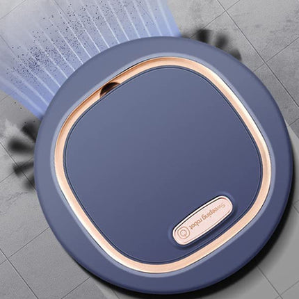 Blue and rose gold circular device on a gray floor