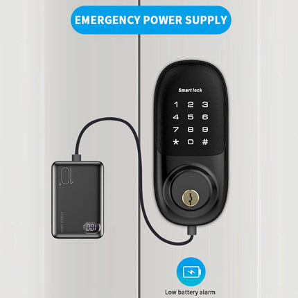 Smart lock with emergency power supply attached to a white door.