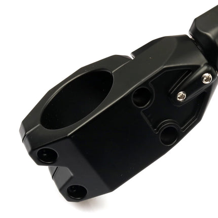A close-up of a matte black metal bicycle stem clamp with a quick-release bolt, shown on a plain white background.