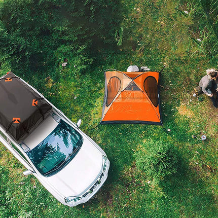Camping scene with a car, tent, and campfire in a forest