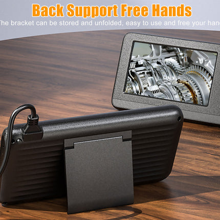 Black back support device on a wooden surface with text about its features.