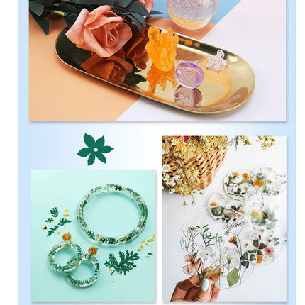 Decorative items including a gold tray with flowers, green floral bracelets, and a floral design on a card.