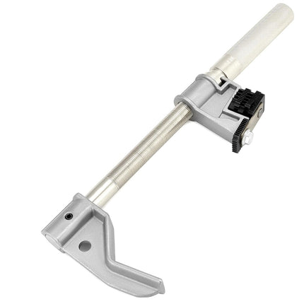 Metal tool with a white handle on a white background