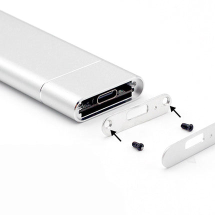 Close-up of a silver electronic device with connectors on a white background