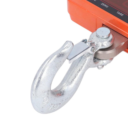 Close-up of a metal hook attached to an orange digital scale on a white background