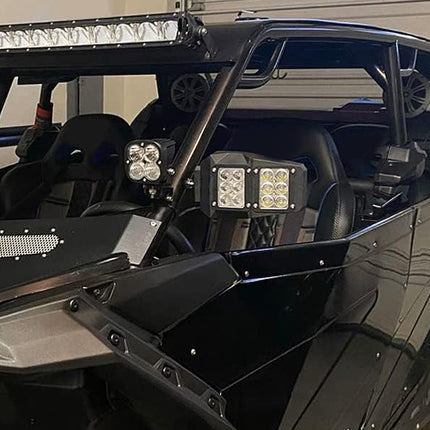 Black off-road vehicle with additional lights and equipment inside