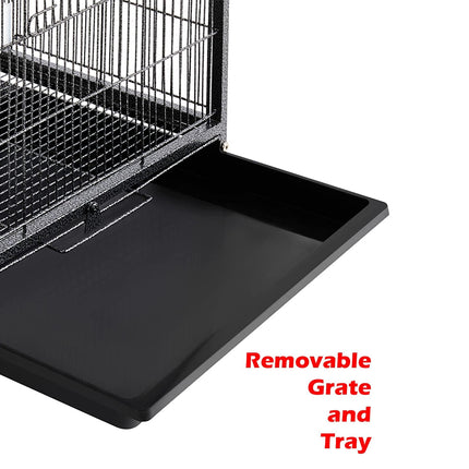 Bird cage with a removable black tray and grate on a white background