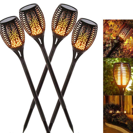 Set of four decorative solar lamps with flame pattern on a white background