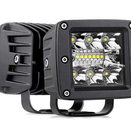 Two off-road LED lights with black casings on a white background