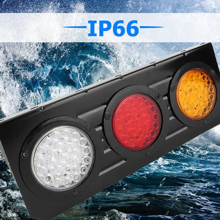 A black marine LED signal light with three circular lenses (white, red, and amber/yellow) shown against a blue ocean wave background with an 'IP66' text banner at the top.