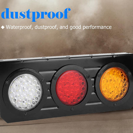 A rectangular automotive-style light unit with three circular lenses: a white LED array on the left, a red lens in the center, and an amber/yellow lens on the right, mounted on a black housing. Blue text at the top reads 'dustproof' with smaller white text below describing waterproof and dustproof performance.