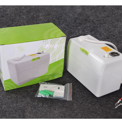 White electronic device with packaging and accessories on a dark surface