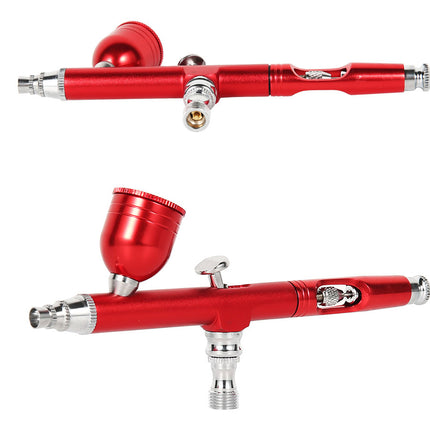 Two red airbrush pens shown on a plain white background, one oriented horizontally and the other vertically, both with silver metal tips and controls.