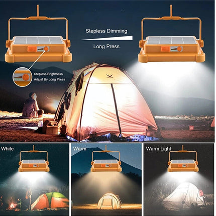 Camping light with stepless dimming feature, shown in use around a tent.