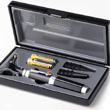 A medical examination kit in an open black plastic case, containing a otoscope, two black and silver handles, two yellow and black batteries, and two black tips on a white background.