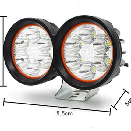 Pair of round LED lights with measurements on a white background