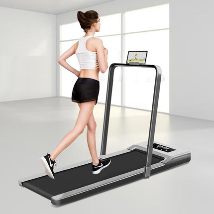 Woman using a treadmill in a minimalistic room