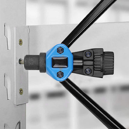 Close-up of a black and blue mechanical component attached to a metal surface with a blurred background.