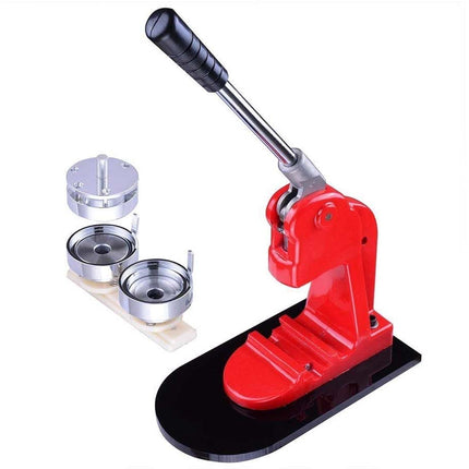 Red manual press machine with two metal dies on a white background