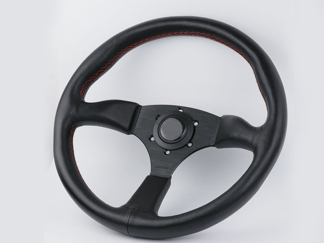 Black steering wheel with red stitching on a white background