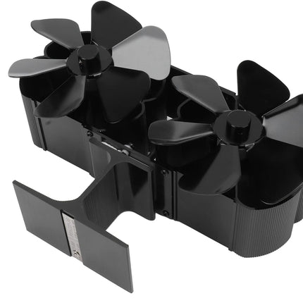 Black propeller-like device on a white background