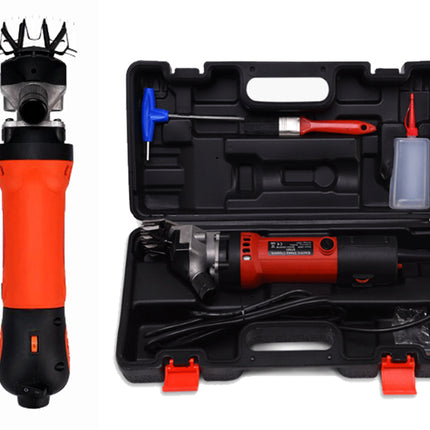 Electric sheep shearing machine with attachments in a black case on a white background