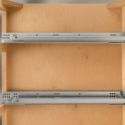Wooden cabinet with two metal drawer slides on a white background