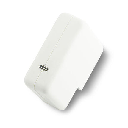 White rectangular object with a USB port on a white background