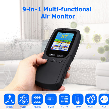 Hand holding a 9-in-1 multi-functional air monitor with a blurred indoor background