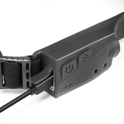 Black dog collar with electronic components on a white background
