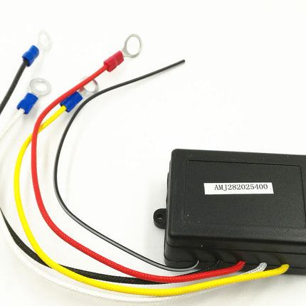 Black electronic module with wires on a white background