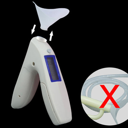 Infrared thermometer with a close-up inset showing a incorrect usage method.